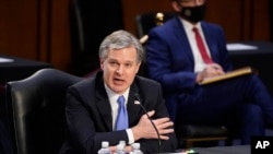 Giám đốc Cục điều tra Liên bang Mỹ (FBI) Chris Wray điều trần trước Ủy ban Tư pháp Thượng viện Mỹ ngày 2/3/2021.